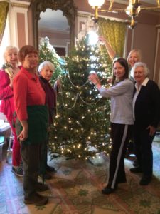 Members of the Community Garden Club hard at work decorating the Doric House parlor! 